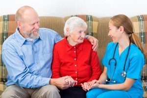 Elderly woman and her son at the doctor